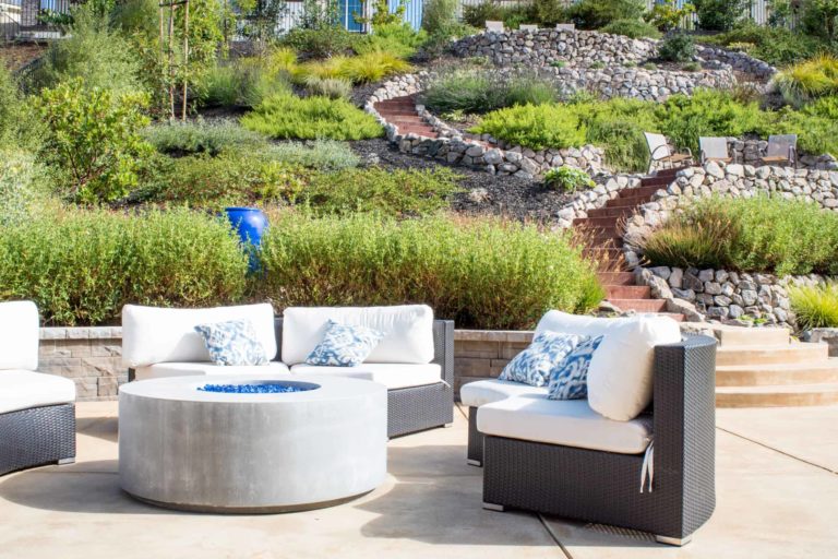 Contemporary hillside terracing with fun walkways throughout the wandering gardens